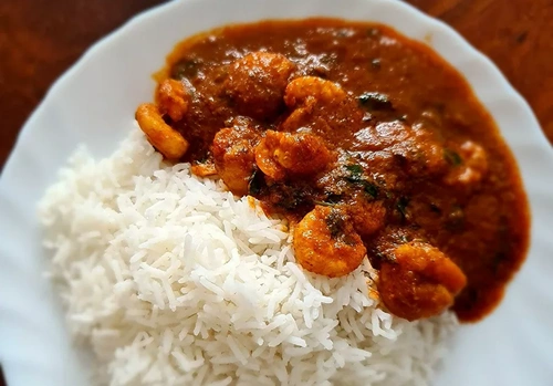 Индийское блюдо виндалу с рисом Индийское блюдо виндалу с рисом